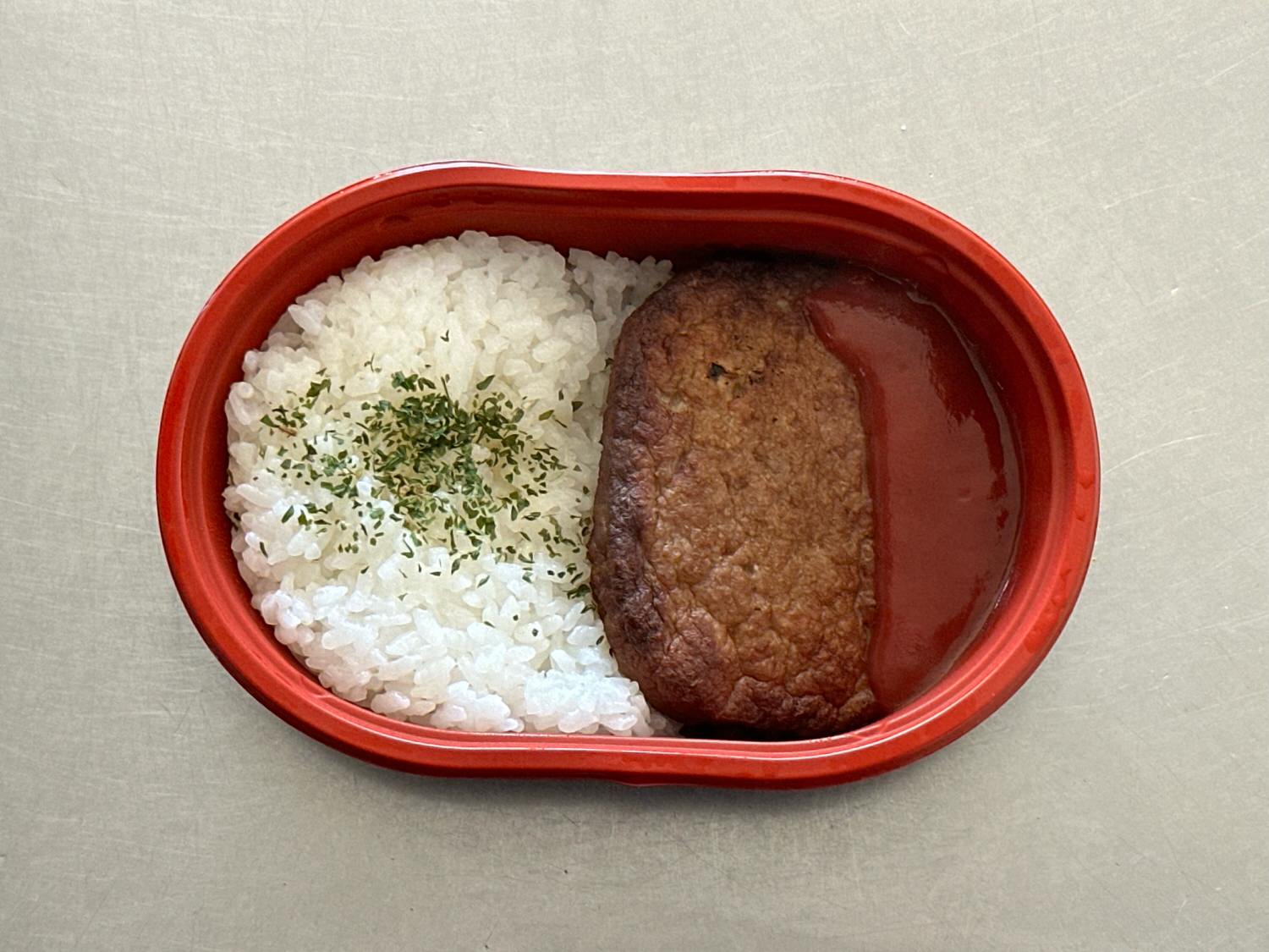 ローソンストア100 だけ弁当（マルシンハンバーグ）